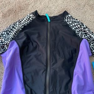 Brand new with tags size large long sleeve women’s swimsuit